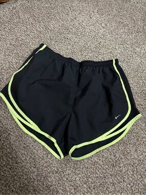 Nike Women’s Black Athletic Shorts with Neon Yellow Trim